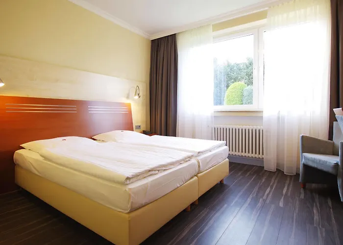 Quarto comfort com cama king
